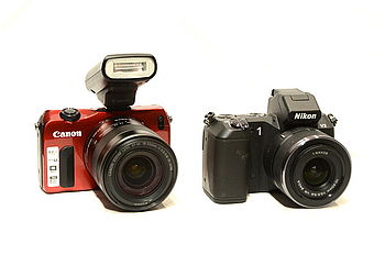 Canon EOS M, Nikon 1 V2