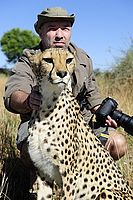 Petr Slavík with cheetah, Namibia